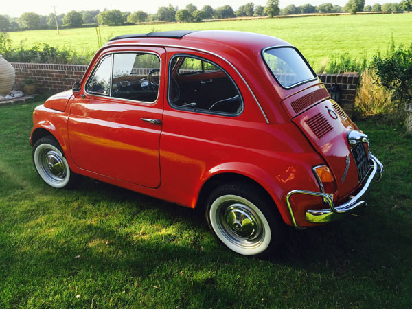 Fully restored 1972 Fiat 500 in coral red