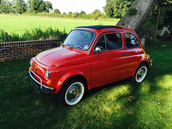 Fully restored 1972 Fiat 500 in coral red