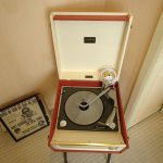 Restored 1960s Dansette Bermuda record player with legs