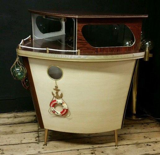 Restored 1950s boat-shaped cocktail bar