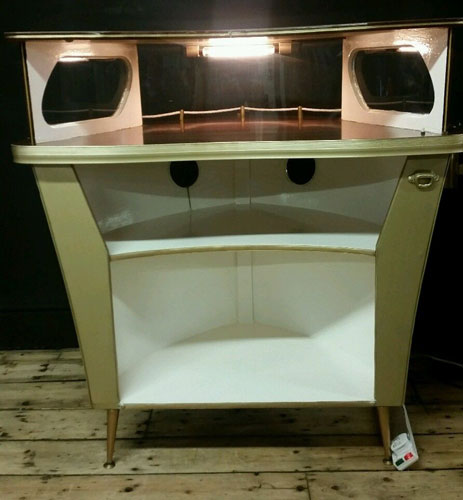 Restored 1950s boat-shaped cocktail bar