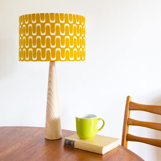 Retro-style barkcloth table lamps and cushions at Hunkydory Home