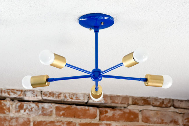 Midcentury-inspired chandeliers by Illuminate Vintage