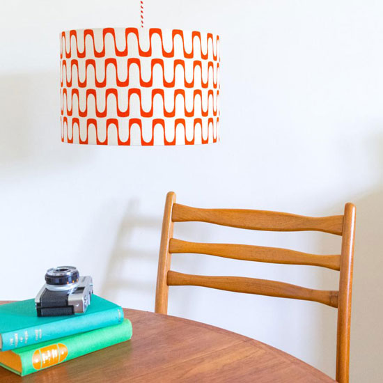 Retro-style barkcloth table lamps and cushions at Hunkydory Home