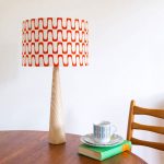 Retro-style barkcloth table lamps and cushions at Hunkydory Home