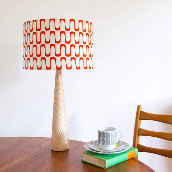 Retro-style barkcloth table lamps and cushions at Hunkydory Home