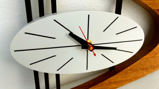 Midcentury-style Boomerang wall clock by TNT Designs