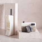 Retro car phone and camera in marble at West Elm