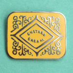 Classic biscuit enamel badges by Nikki McWilliams at Etsy