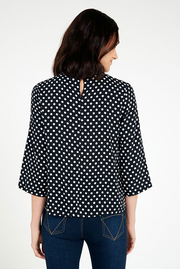 Vintage-style Charnelle high-neck spot top at Joy