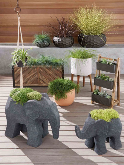 Midcentury-style concrete planters at Next