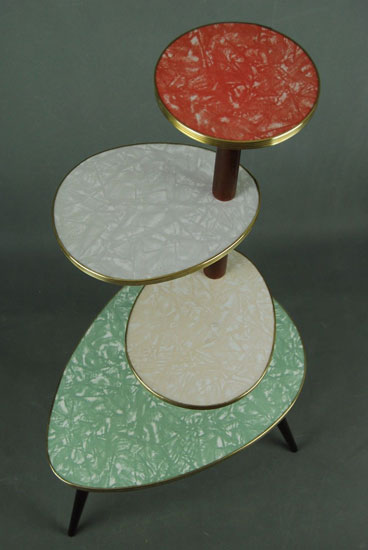 1950s plant stand with patterned tops on eBay