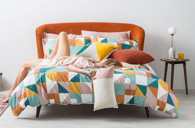 Retro bedroom: Lulu bed at Made now available in an orange velvet finish