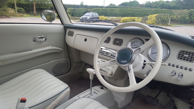 Fully restored Nissan Figaro on eBay