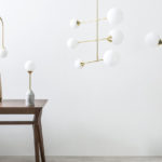 Faye midcentury-style chandelier in brass at Made