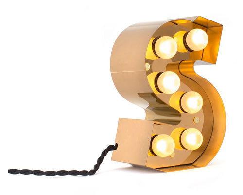 Vintage-style Caractere alphabet wall lights by Seletti