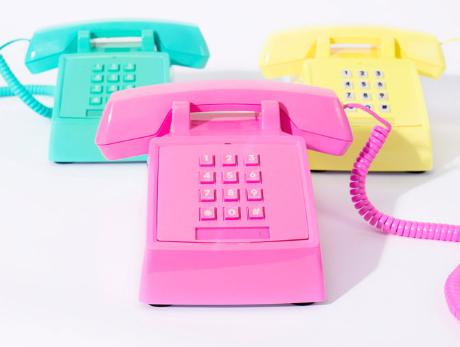 1980s-style neon push button telephones at Firebox