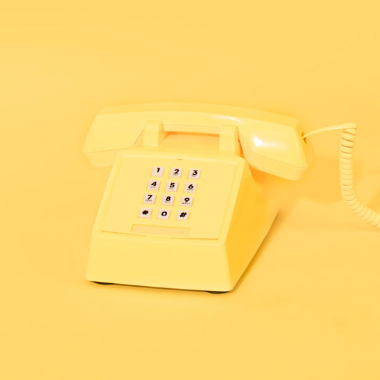 1980s-style neon push button telephones at Firebox