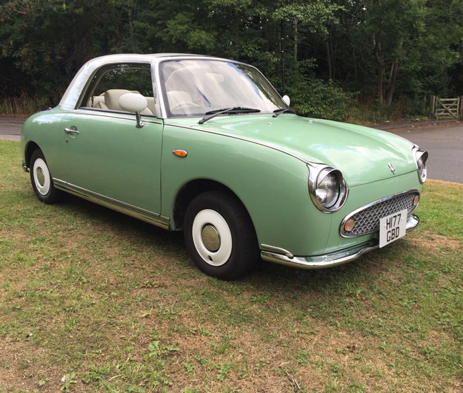 Nissan Figaro in emerald green on eBay