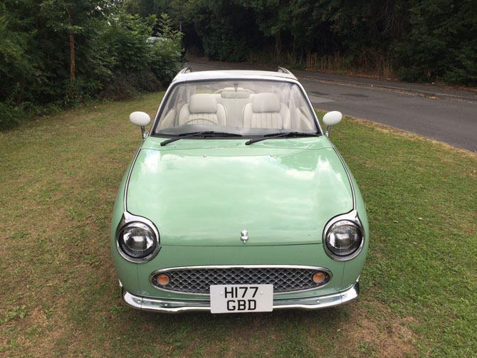 Nissan Figaro in emerald green on eBay