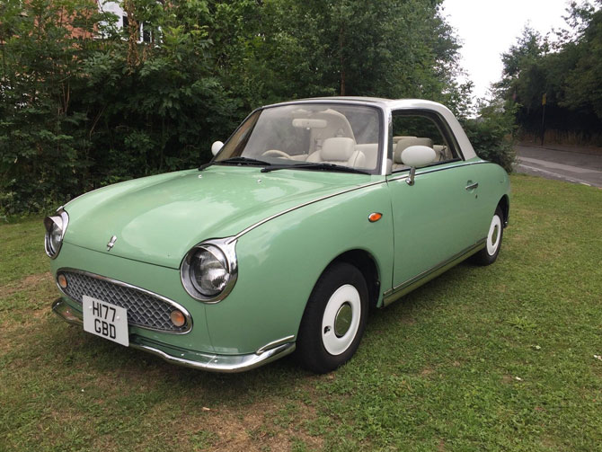 Nissan Figaro in emerald green on eBay