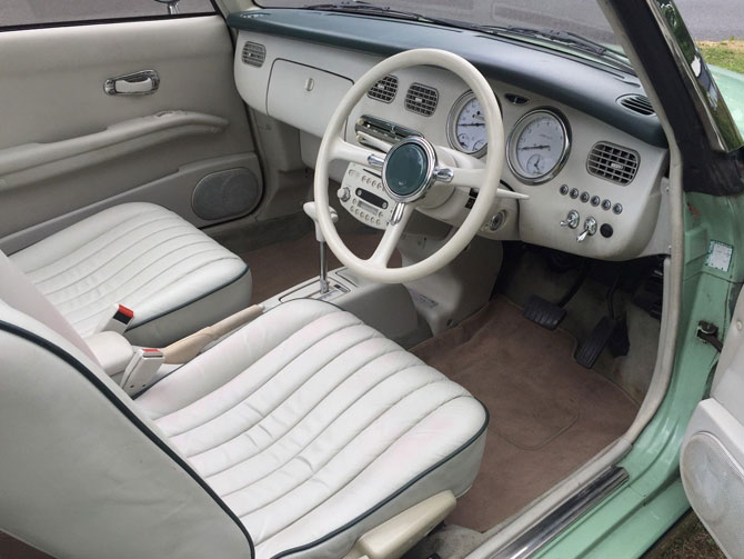 Nissan Figaro in emerald green on eBay