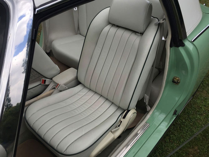 Nissan Figaro in emerald green on eBay