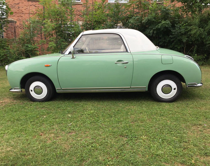 Nissan Figaro in emerald green on eBay