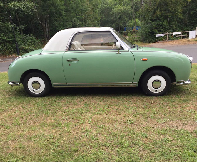 Nissan Figaro in emerald green on eBay